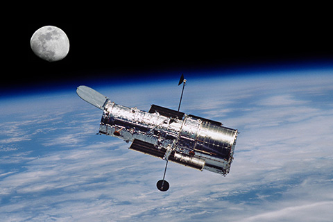 Hubble telescope in orbit. © Can Stock Photo Inc. / njnightsky